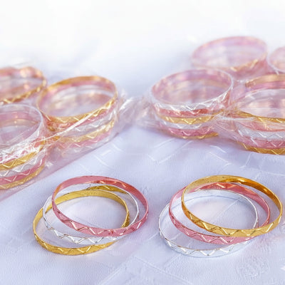 Tri-Color Bangle Set (Gold, Silver, & Rose Gold).